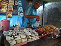 Warung kopi, small shop selling coffee, tea, and snacks.