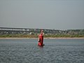 Kids playing on a buoy in the Volga