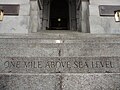 Front steps indicating "One Mile Above Sea Level"