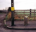 The milestone and the track up to the old Busbie Colliery and coalpits.