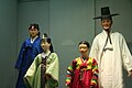 Museum display of a family in traditional Korean dress of Joseon