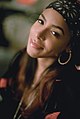 Image 6Aaliyah wearing a bandana and hoop earrings in 2000 (from 2000s in fashion)