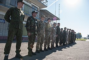 Military personnel of the countries participating in the "Rapid Trident 2014" exercise assembled in front of the training center's command post