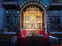 Altar of the St. Mary's Church in Kottayam; also can be seen are two Saint Thomas Crosses from the 7th century on either side. The church was originally built in 1550 CE.