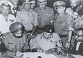 Image 60Pakistan Army General A. A. K. Niazi signing surrender agreement before Sh. Jagjit Singh Aurora of Indian Army after getting defeated in the 1971 Bangladesh Liberation War against East Pakistan, which eventually liberated as Bangladesh later. (from 1970s)