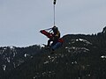 HFRS technician landing with the aerial rescue platform.