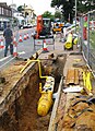 Image 32Polyethylene plastic main being placed in a trench (from Natural gas)