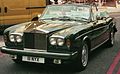 Rolls Royce Corniche c. 1986, a high-end prestige marque with a manually installed tonneau cover