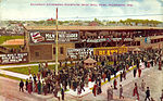 Postcard showing a crowd outside of Borchert Field