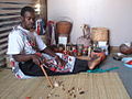 Image 10Traditional healer of South Africa performing a divination by reading the bones. Credit: User:FastilyClone (Fastily) For more about this picture, see Divination in Traditional African religions and African divination