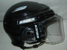 An ice hockey helmet on a table