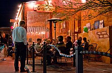 Outdoor cafe at night