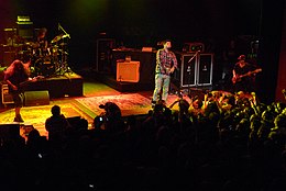 Deftones in 2011 at the Shepherd's Bush Empire. Shown from left to right: Carpenter, Cunningham, Moreno, and Vega.