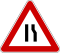 Road narrows on right side