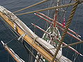 The masts and yards of a brig, a typical tall ship.