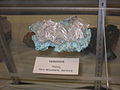 As crystalline ore