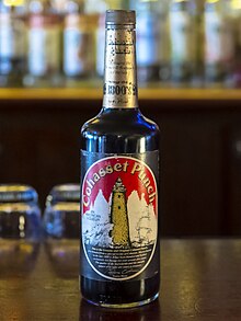 A bottle of Cohasset Punch from the mid-1980s sitting atop a bar.