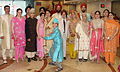 Men, women and children of a Sikh family from Punjab, India at a wedding