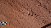 Side-by-side rock carvings