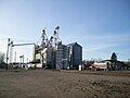 Grain storage and rail line.