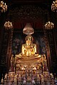 The statues of Phra Phuttha Chinnasi (front) and Phra Suwannakhet (back) in the main shrine hall. The ashes of King Rama IX are kept under the base of the statues