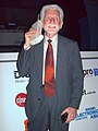 Image 16Martin Cooper of Motorola, shown here in a 2007 reenactment, made the first publicized handheld mobile phone call on a prototype DynaTAC model on 3 April 1973. (from Mobile phone)