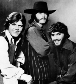 The Stampeders in 1971: from left to right, Ronnie King (bass, vocals), Rich Dodson (guitar, vocals), Kim Berly (drums, vocals).