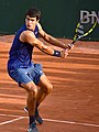 Image 9Carlos Alcaraz, the 2024 men's singles champion. At 21, he became the youngest male player to win a major title on three different surfaces. (from French Open)