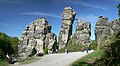 Image 1 Externsteine Photo credit: Daniel Schwen The Externsteine, a distinctive rock formation located in the Teutoburger Wald region of northwestern Germany, are a popular tourist attraction. Stairs and a small bridge connecting two of the rocks lead to the top.