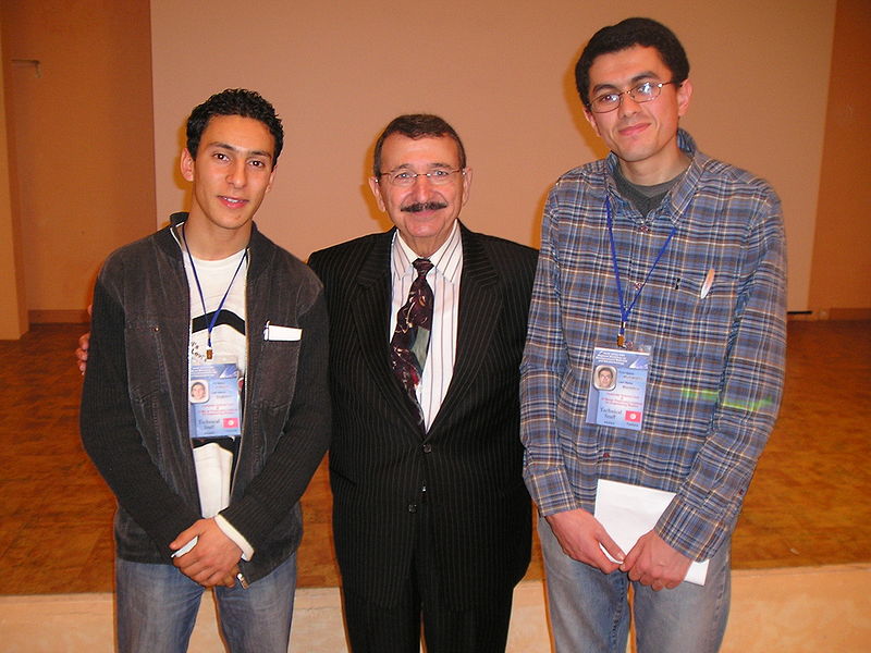 File:Mostapha with 2 students.JPG