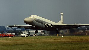 A side-underneath view of a Nimrod MRA4 as it flies past.