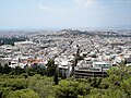 Modern Athens is a bustling cosmopolitan city. Parts of central Athens as seen from Lycabettus Hill.