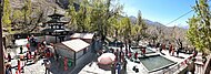 Muktinath Temple with 2 ponds (right) and 108 spouts (left)