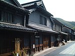 A row of black houses.