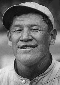 Headshot of Thorpe grinning wearing his New York Giants jersey and cap.