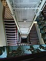 The stairwell and original wire cage lift shaft, still in use.