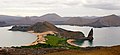 Image 13Pinnacle Rock on Bartolomé Island, with Santiago in the background and a ferry on the right for scale (from Galápagos Islands)