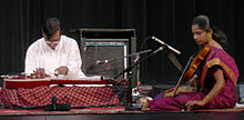 Akkarai Subhalakshmi accompanying N. Ravikiran in a Carnatic Chitravina concert