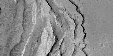 Tilted layers formed when ground collapsed, as seen by HiRISE, under HiWish program