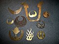 Various Japanese maedate, crests that are mounted in the front of a samurai helmet kabuto.