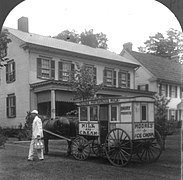 An American milkman with a delivery wagon, 1925