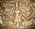 Detail of Kanishka, surrounded by the Iranian Sun-God and Moon-God, on the Kanishka casket. British Museum.