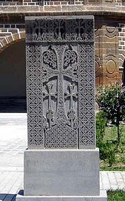 A khachkar behind the cathedral in Echmiadzin, Armenia. Place of origin is unknown.