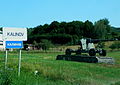 Entering the village of Kalinov (WWII liberation memorial with displayed artillery piece)