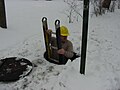 Lineman entering a manhole