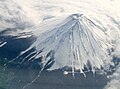 Looking down towards the peak of Mount Fuji and its central crater.