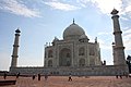 Three people plank the Taj Mahal