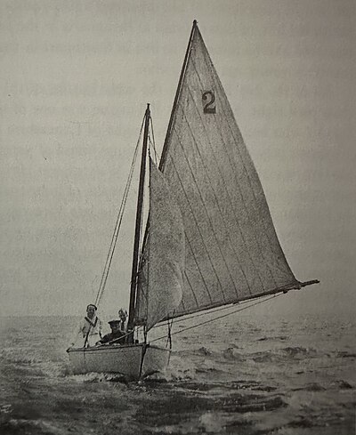 Seabird Half rater No.2 Goshawk pictured in 1898 helmed by Dudley Coddington