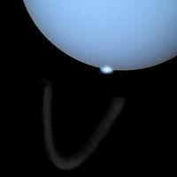 Uranus's aurorae against its equatorial rings, imaged by the Hubble telescope. Unlike the aurorae of Earth and Jupiter, those of Uranus are not in line with its poles, due to its lopsided magnetic field.