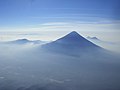 Volcan de Agua exhibits the steep cone shape typical of stratovolcanoes; as seen from Acatenango's Pico Mayor.